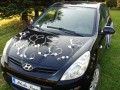 topass-dekoracje-slubna-dekoracja-na-samochod-do-slubu-ratanowe-serca-z-bialymi-platkami (4).jpg